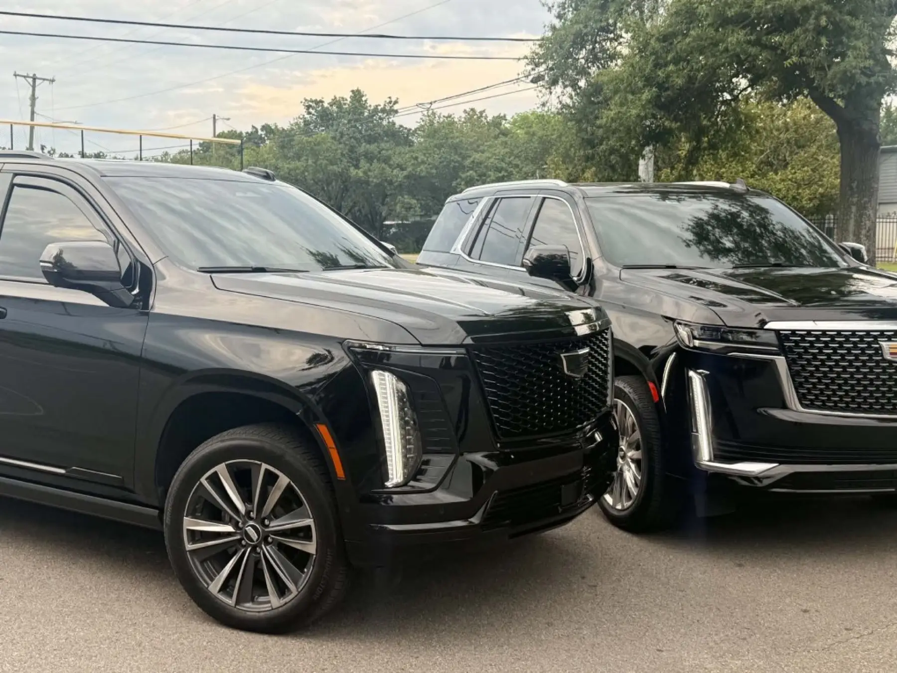 First Class Limo Escalades outdoors